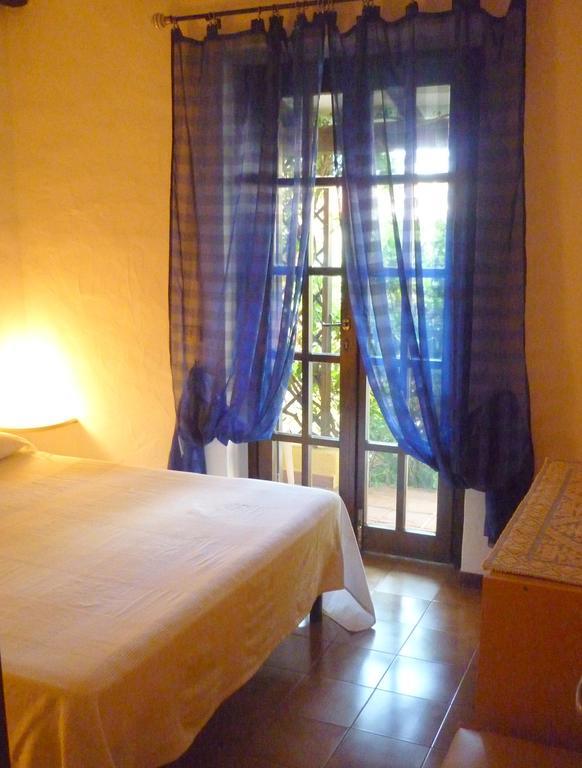 Appartamenti Cannigione La Conia Habitación foto